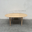 Bok round extendable dining table