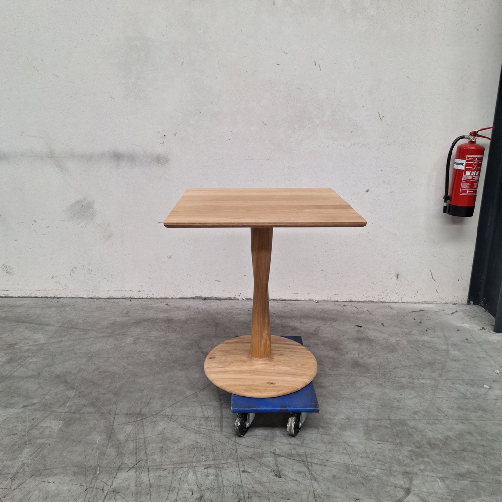 Torsion dining table